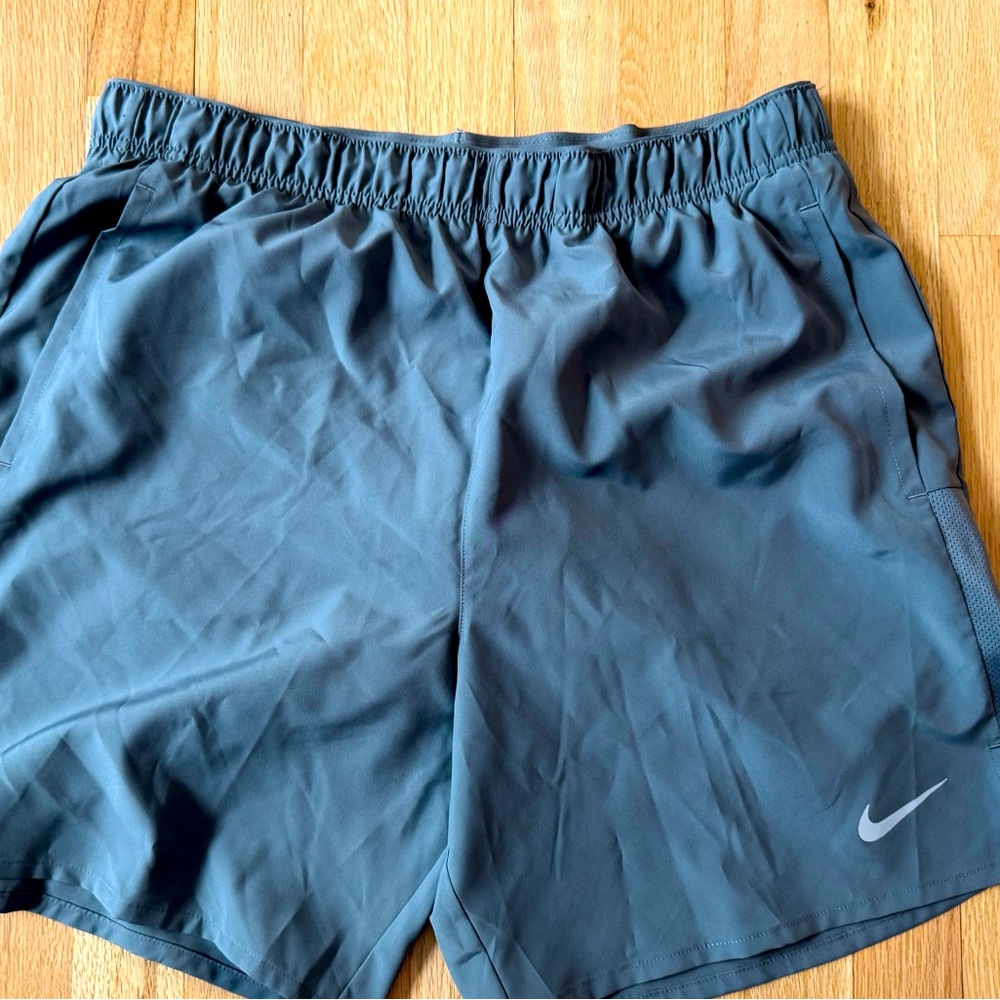 Nike Men’s running short new without tag. Medium